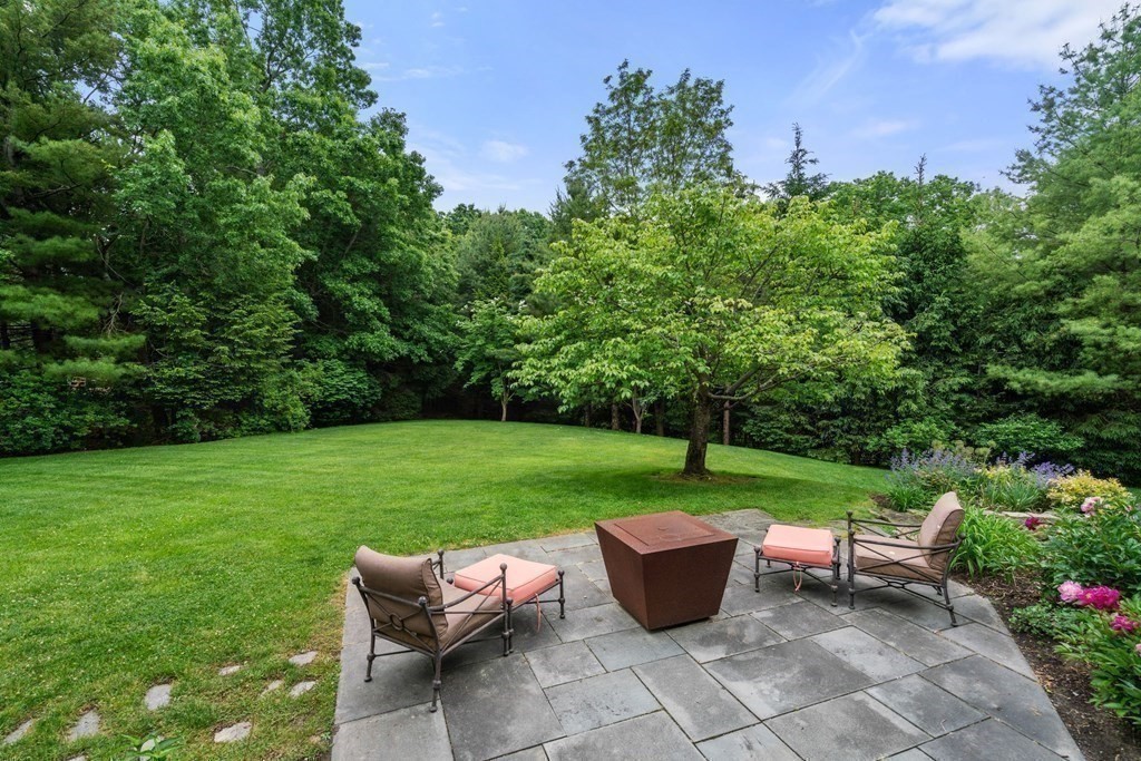 96 Beard Way Needham, MA 02492 - Photo 36 of 39 a view of a sitting area with furniture and garden