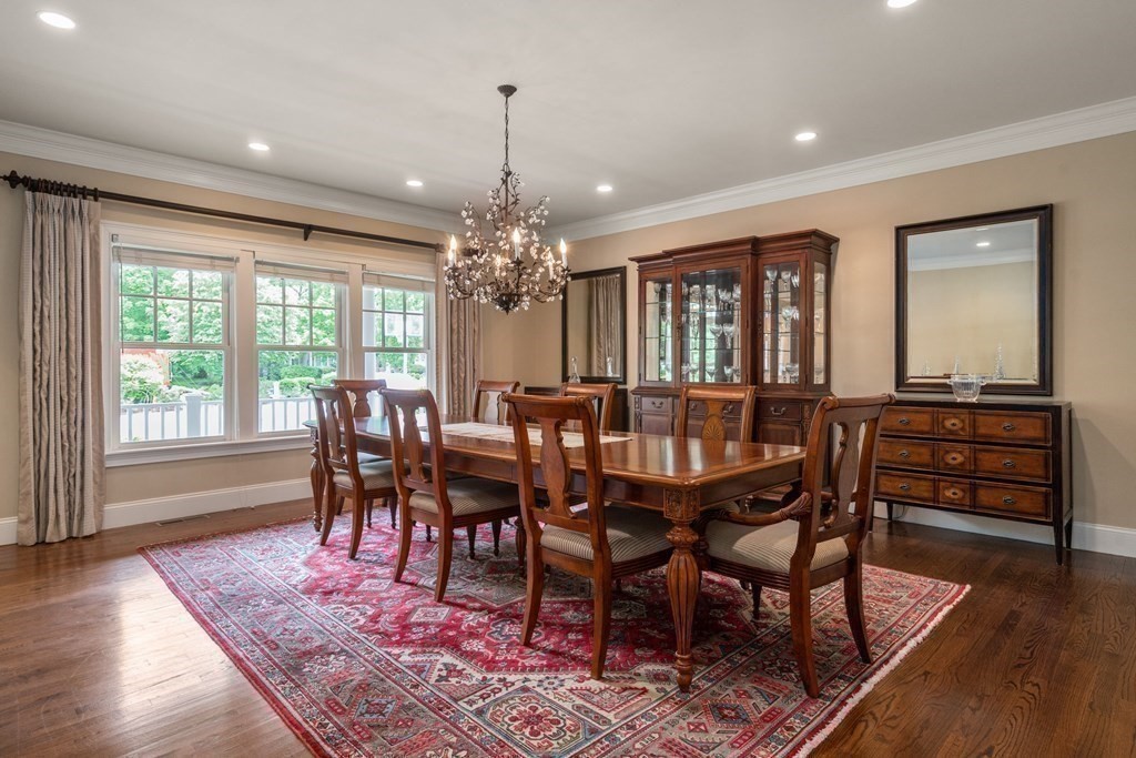 96 Beard Way Needham, MA 02492 - Photo 6 of 39 a view of a dining room with furniture window and wooden floor