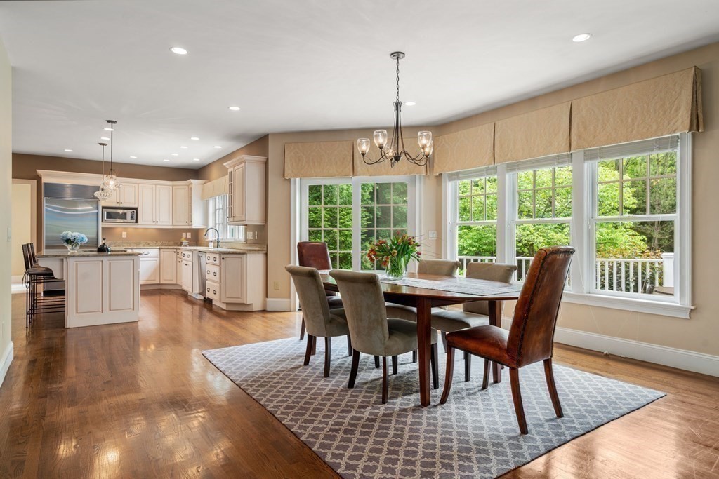 96 Beard Way Needham, MA 02492 - Photo 10 of 39 a view of a dining room with furniture window and wooden floor