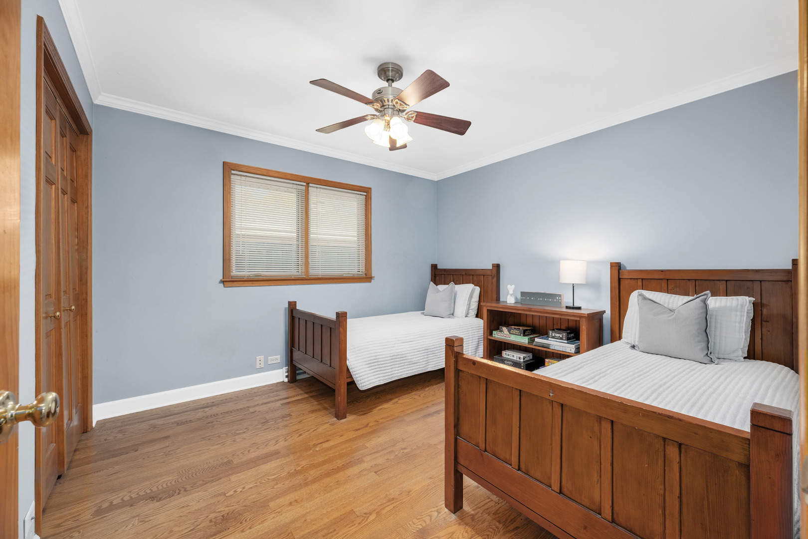 5305 Howard Avenue Western Springs, IL 60558 - Photo 18 of 35 a bedroom with a bed and wooden floor