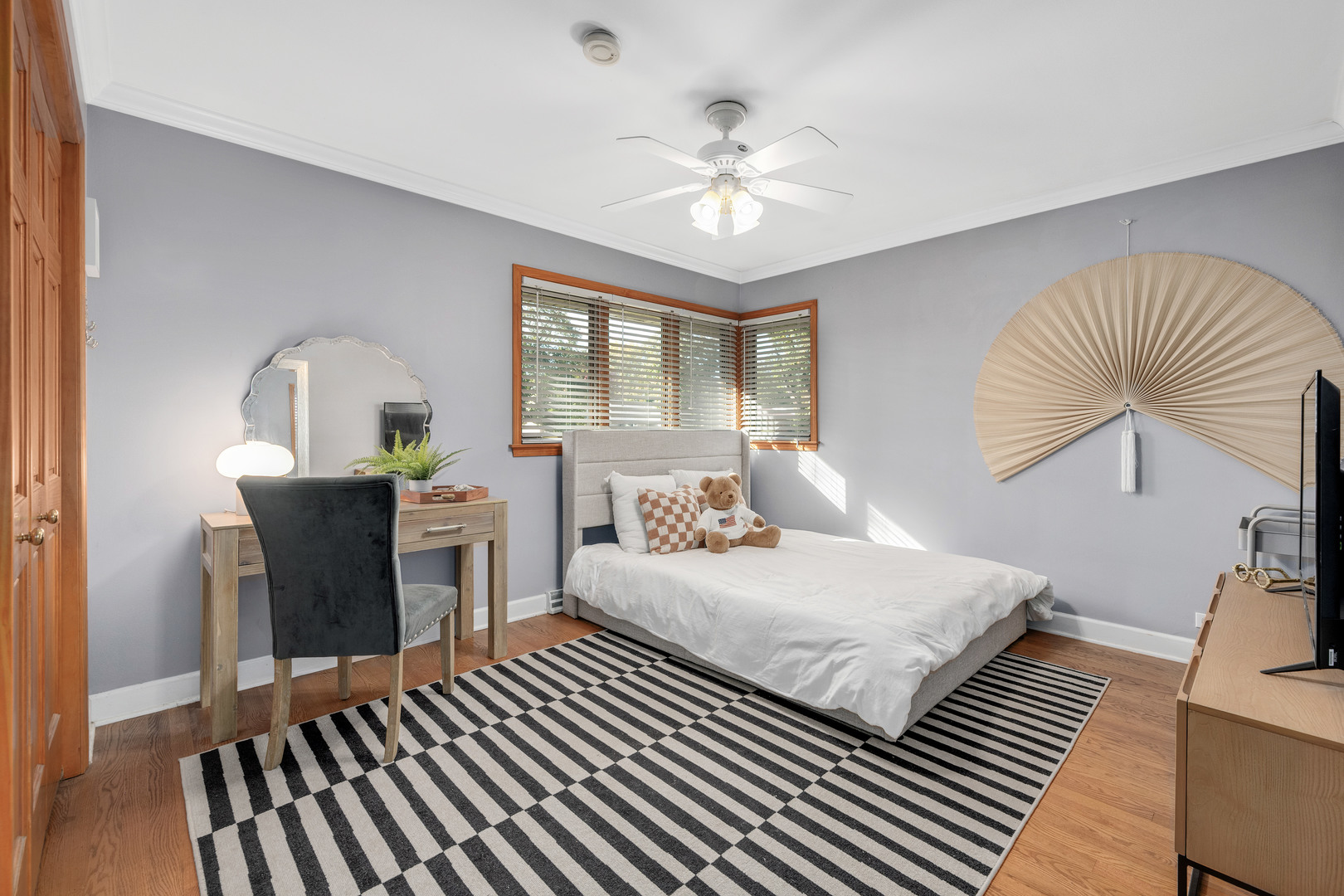 5305 Howard Avenue Western Springs, IL 60558 - Photo 20 of 35 a bedroom with a bed and a chandelier