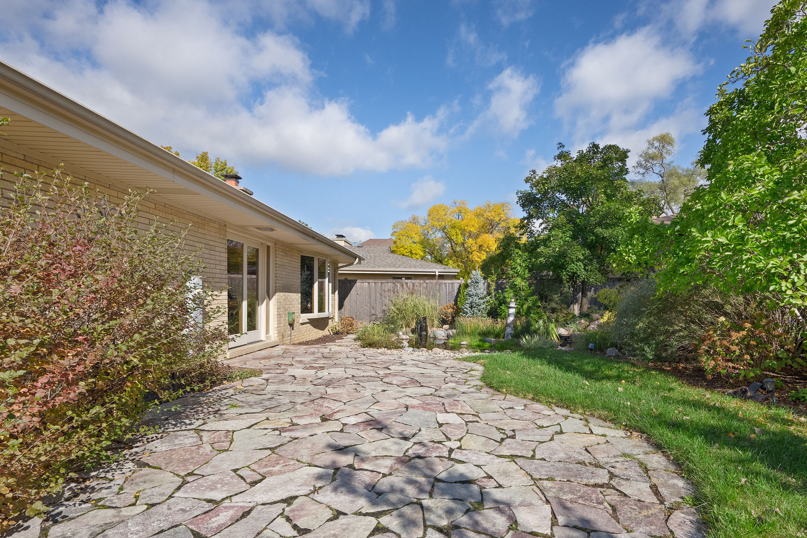 5305 Howard Avenue Western Springs, IL 60558 - Photo 28 of 35 a front view of a house with a yard