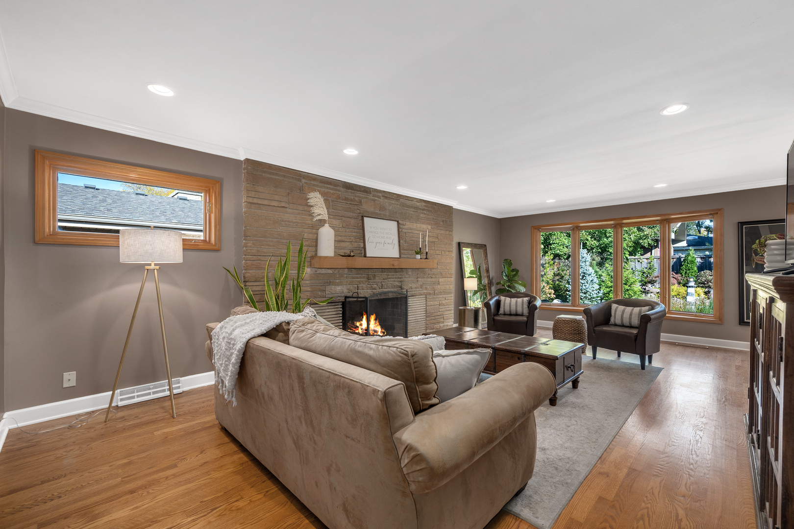 5305 Howard Avenue Western Springs, IL 60558 - Photo 3 of 35 a living room with fireplace furniture and a large window