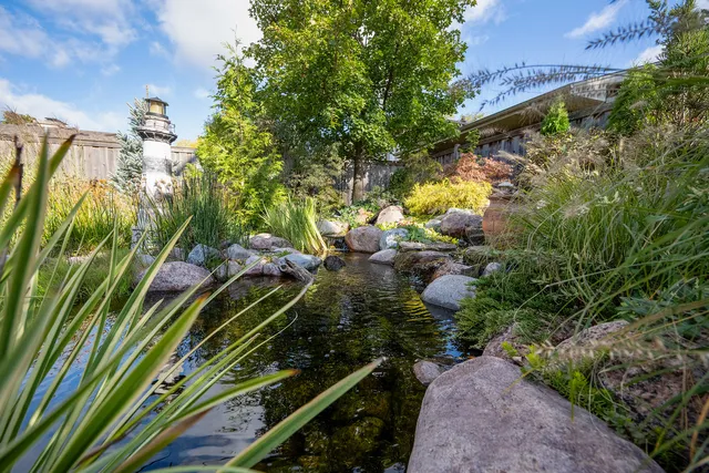 a view of a backyard of the house