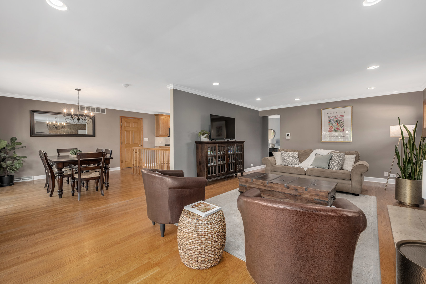 5305 Howard Avenue Western Springs, IL 60558 - Photo 6 of 35 a living room with furniture wooden floor and a kitchen view