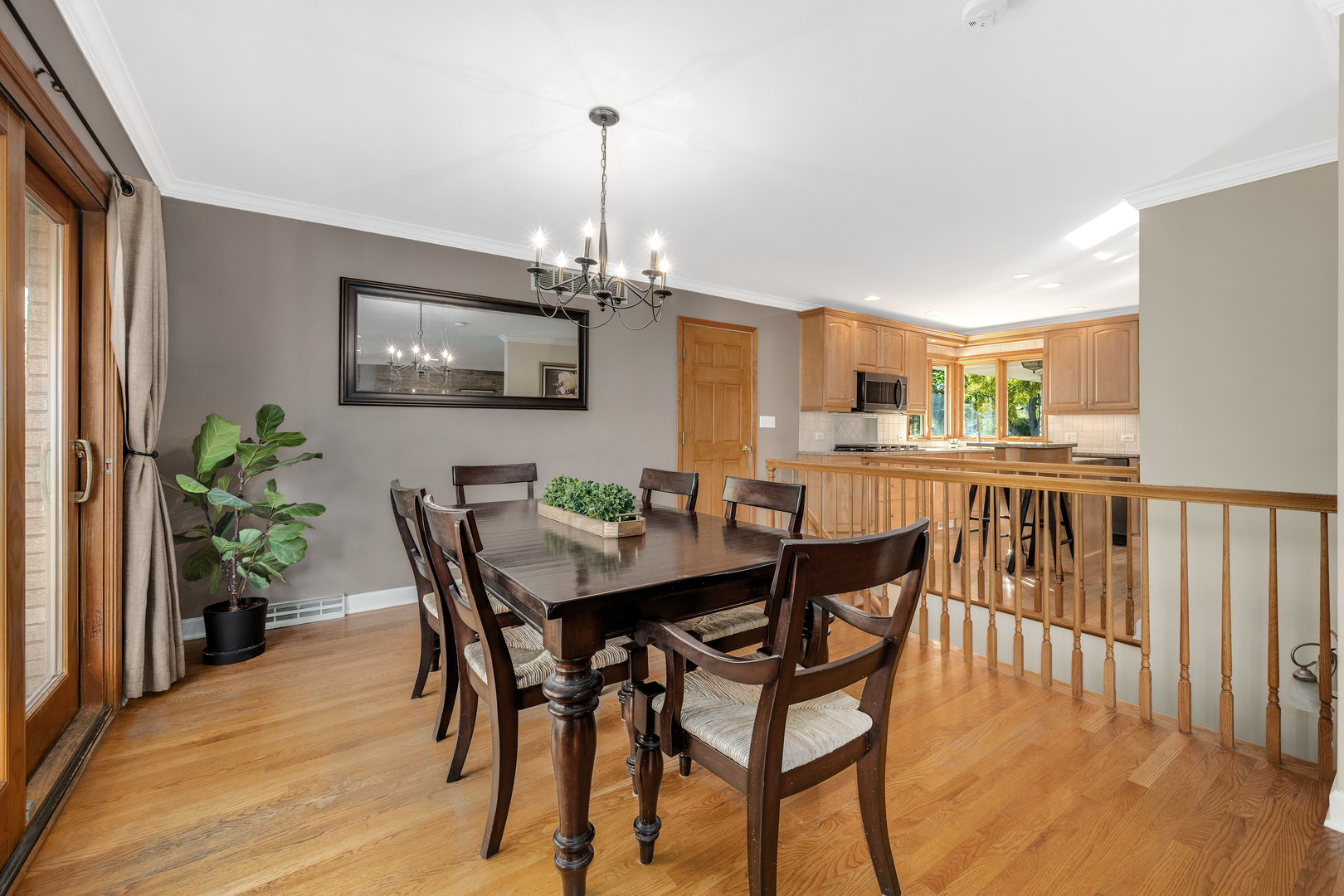 5305 Howard Avenue Western Springs, IL 60558 - Photo 9 of 35 a view of a dining room with furniture wooden floor and chandelier