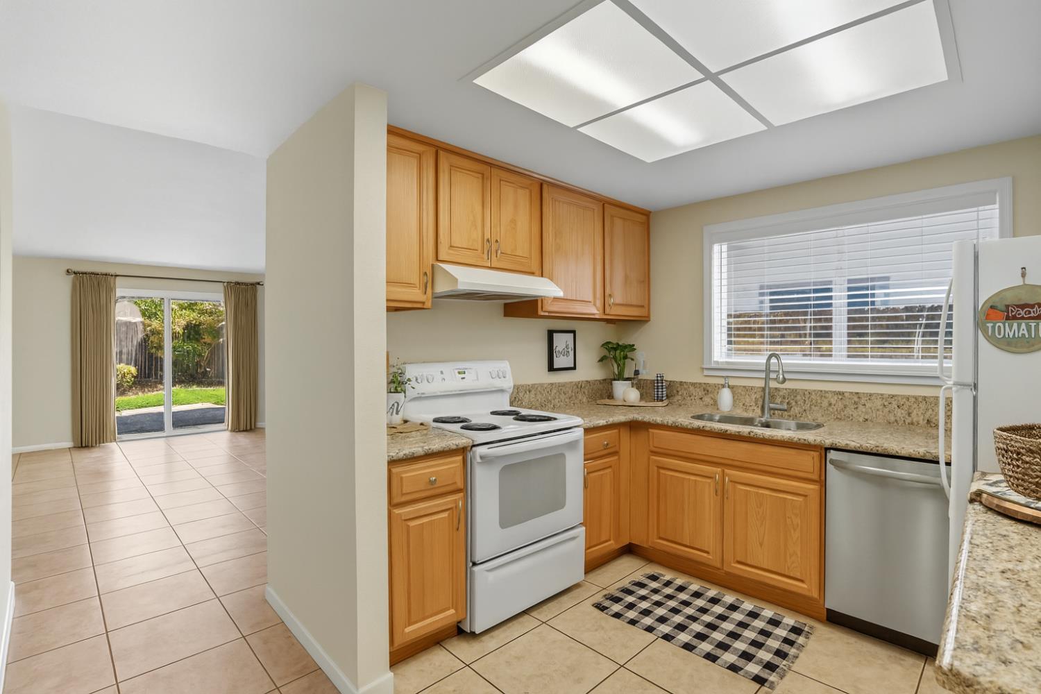 9057 Caldera Way Sacramento, CA 95826 - Photo 23 of 52 Beautiful remodeled kitchen, open and ready for the chef to do their magic!