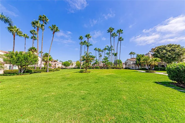 a front view of a house with lots of yellow lighting