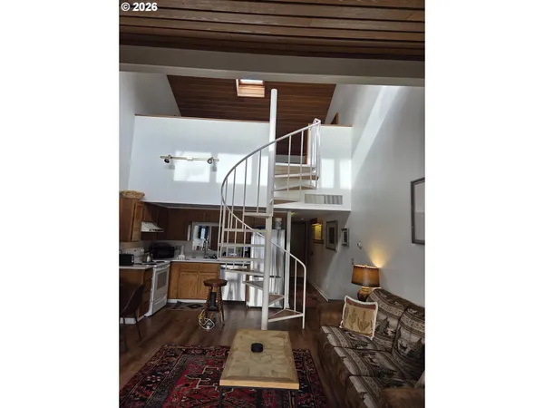 a room with furniture and a fireplace