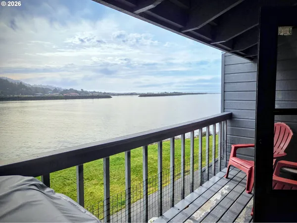 a view of balcony with furniture