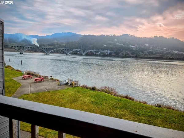 a view of a lake with a mountain in the background