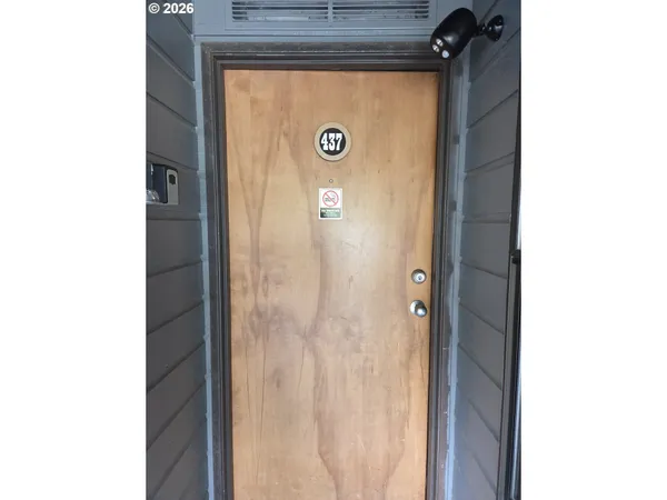 a view of bathroom with a toilet