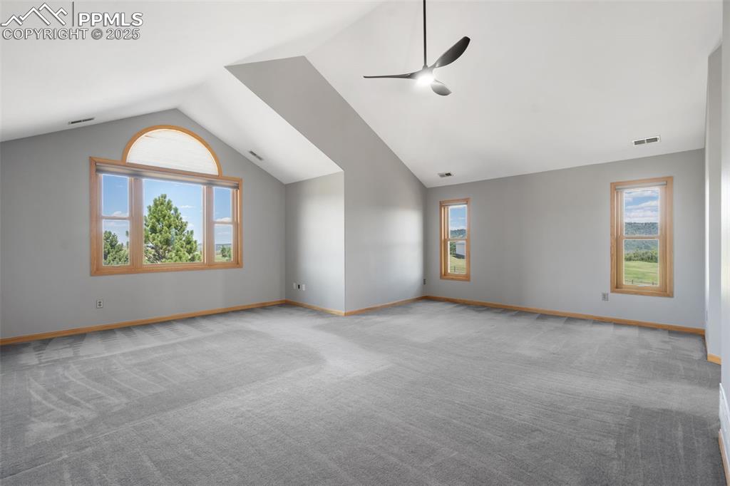 1680 Elk View Road Larkspur, CO 80118 - Photo 22 of 50 an empty room with window