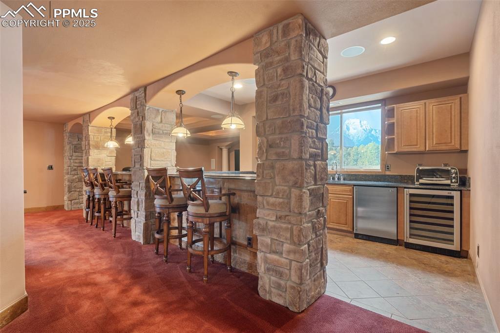 1680 Elk View Road Larkspur, CO 80118 - Photo 32 of 50 a kitchen with lots of counter top space