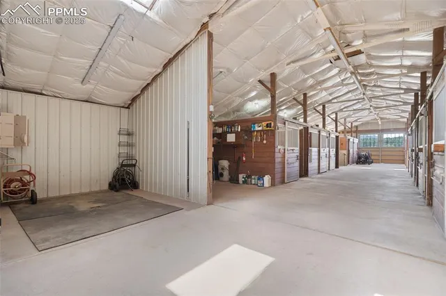 a view of a room with wooden walls
