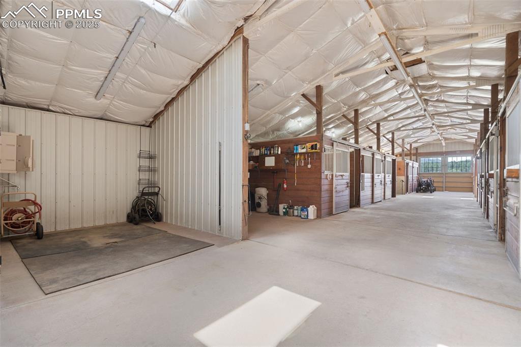 1680 Elk View Road Larkspur, CO 80118 - Photo 45 of 50 a view of a room with wooden walls