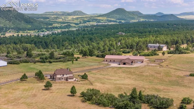 a swimming pool with mountain view