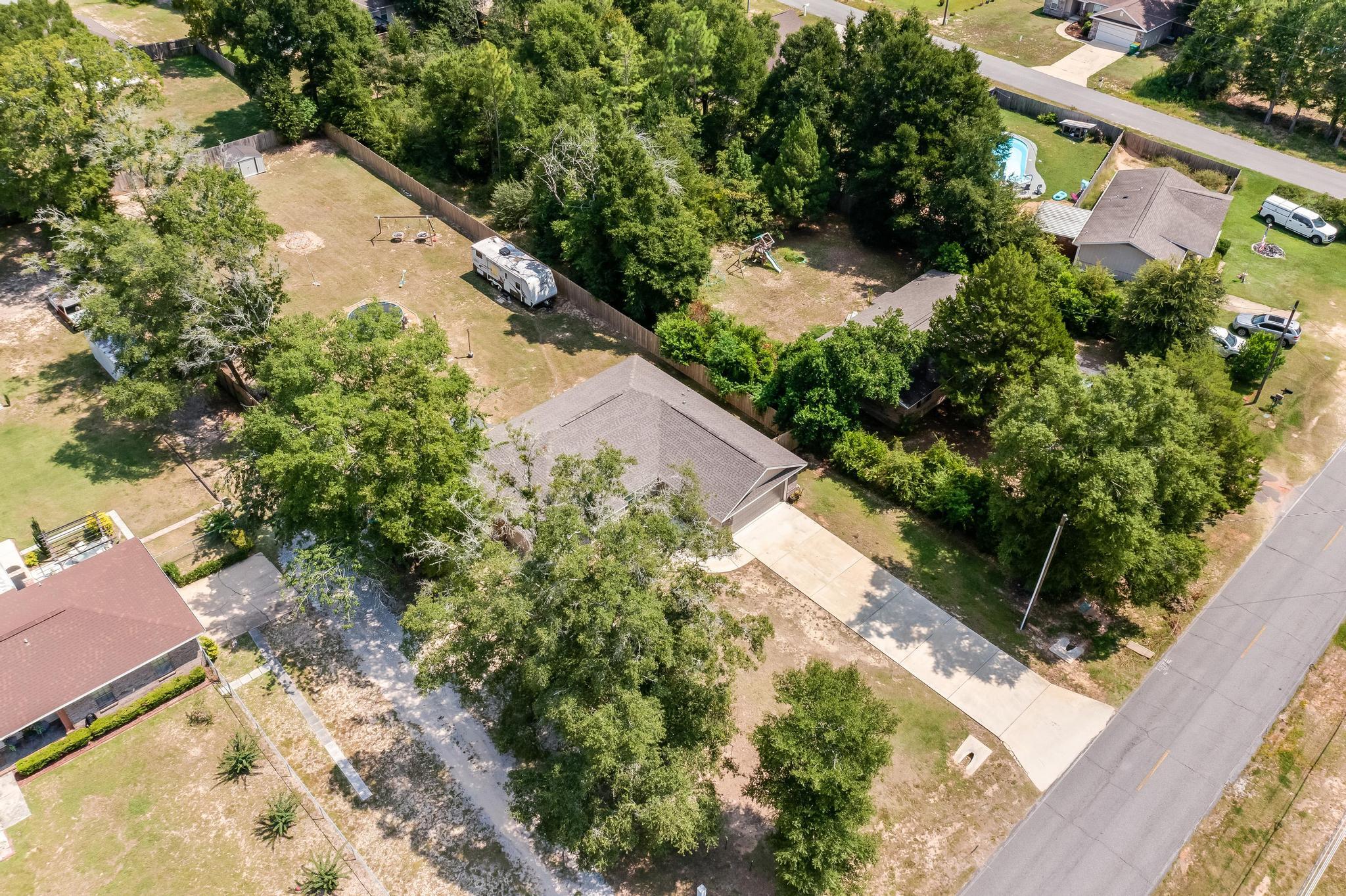 3381 Auburn Road Crestview, FL 32539 - Photo 43 of 46 a view of a garden with a pathway