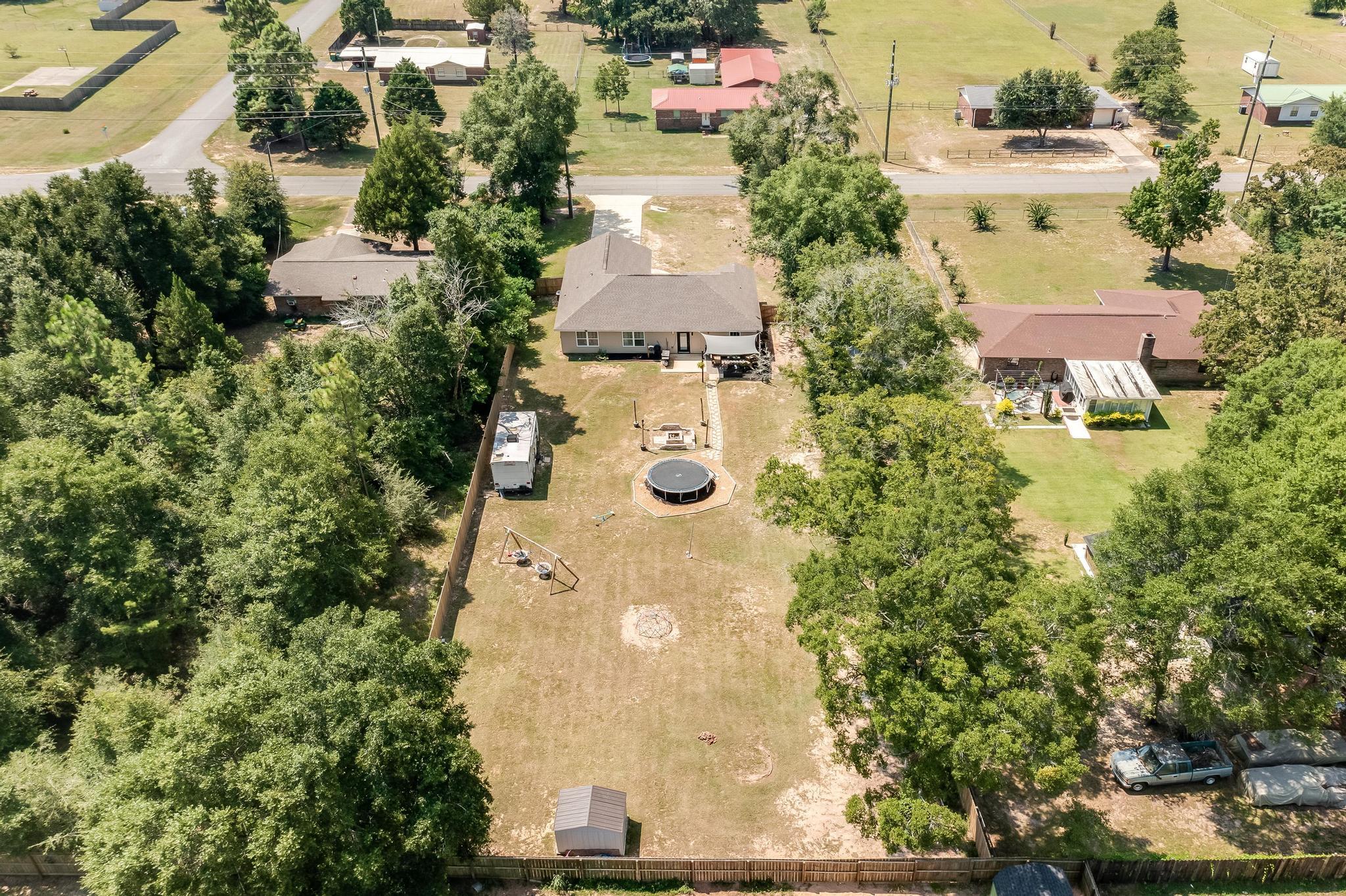 3381 Auburn Road Crestview, FL 32539 - Photo 45 of 46 an aerial view of a house with yard swimming pool and outdoor seating