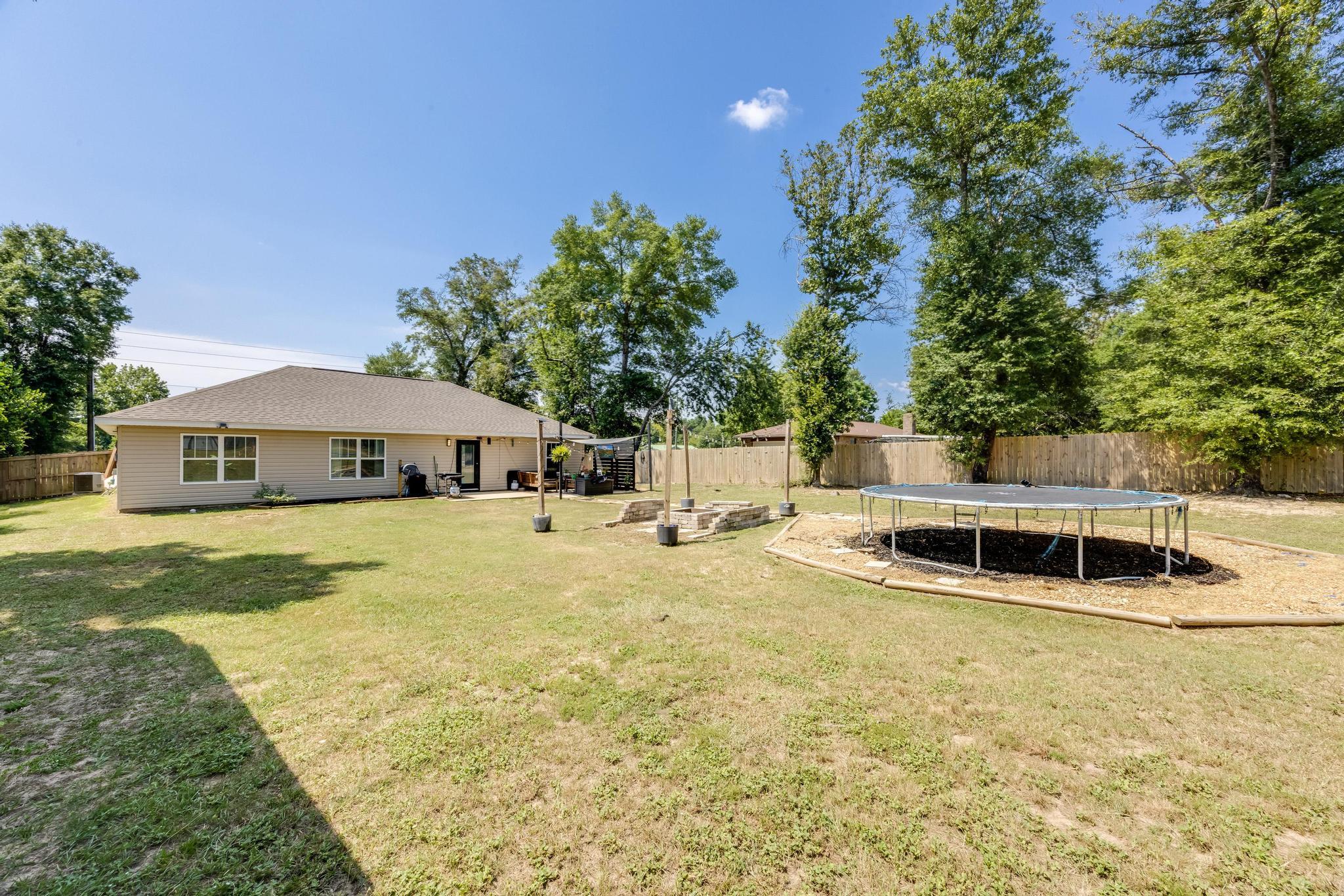 3381 Auburn Road Crestview, FL 32539 - Photo 46 of 46 a view of a house with pool and sitting area