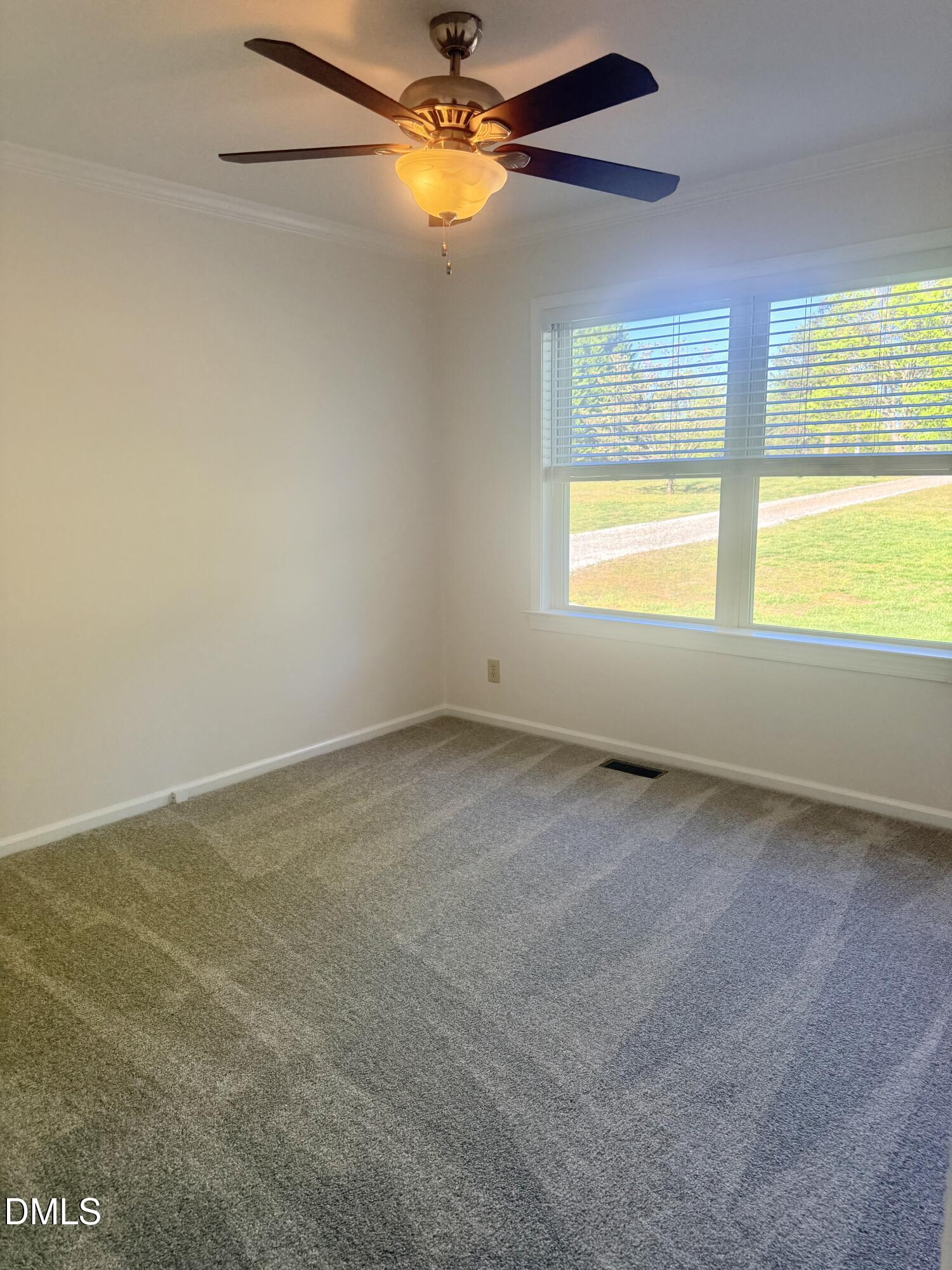2429 Halifax Road Roxboro, NC 27573 - Photo 41 of 54 a view of an empty room with a window