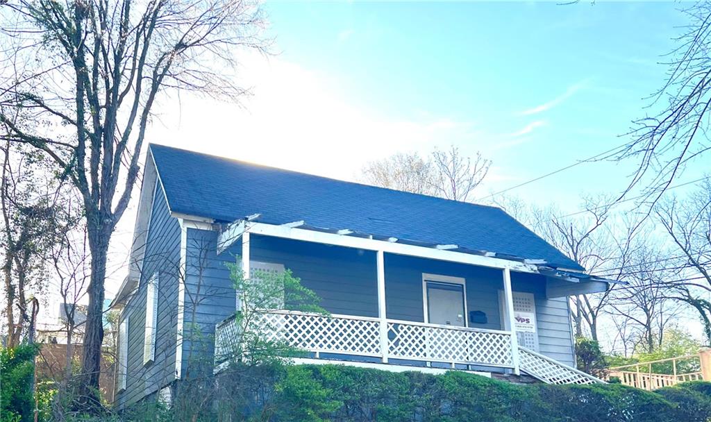 a front view of a house with garage