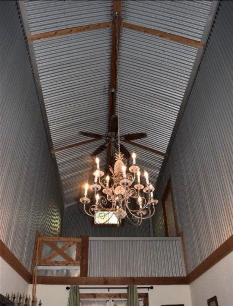 5325 County Road 2291 Centerville, TX 75833 - Photo 17 of 31 Detailed view of walls and a chandelier