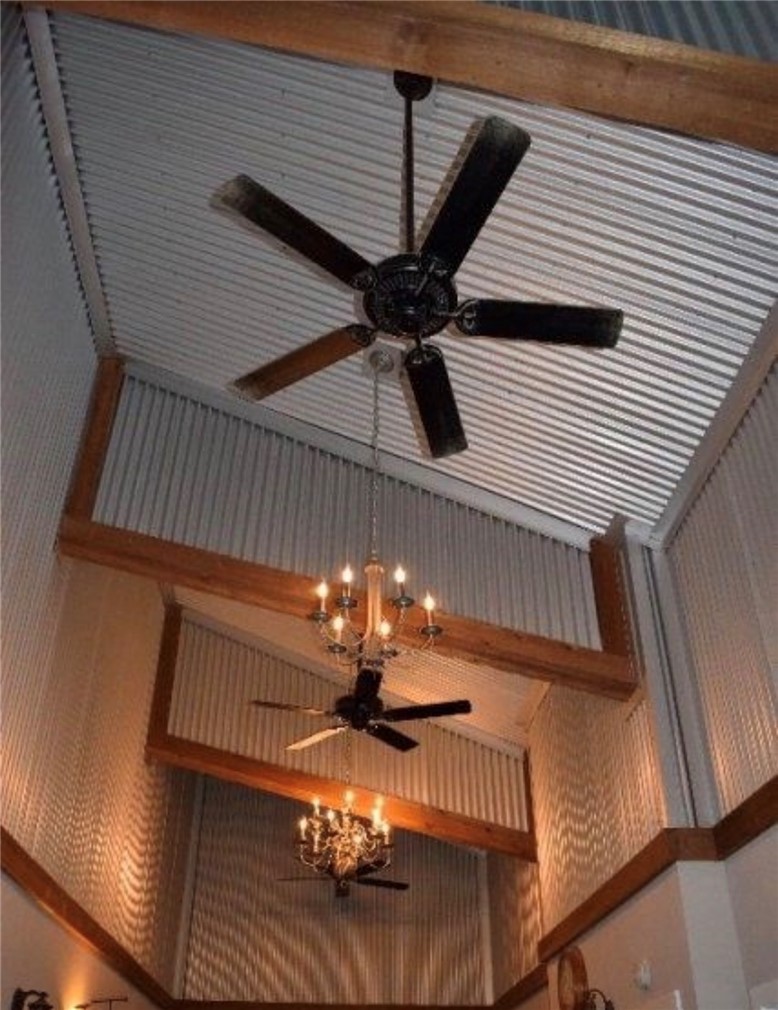5325 County Road 2291 Centerville, TX 75833 - Photo 18 of 31 Detailed view of ceiling fan and a chandelier