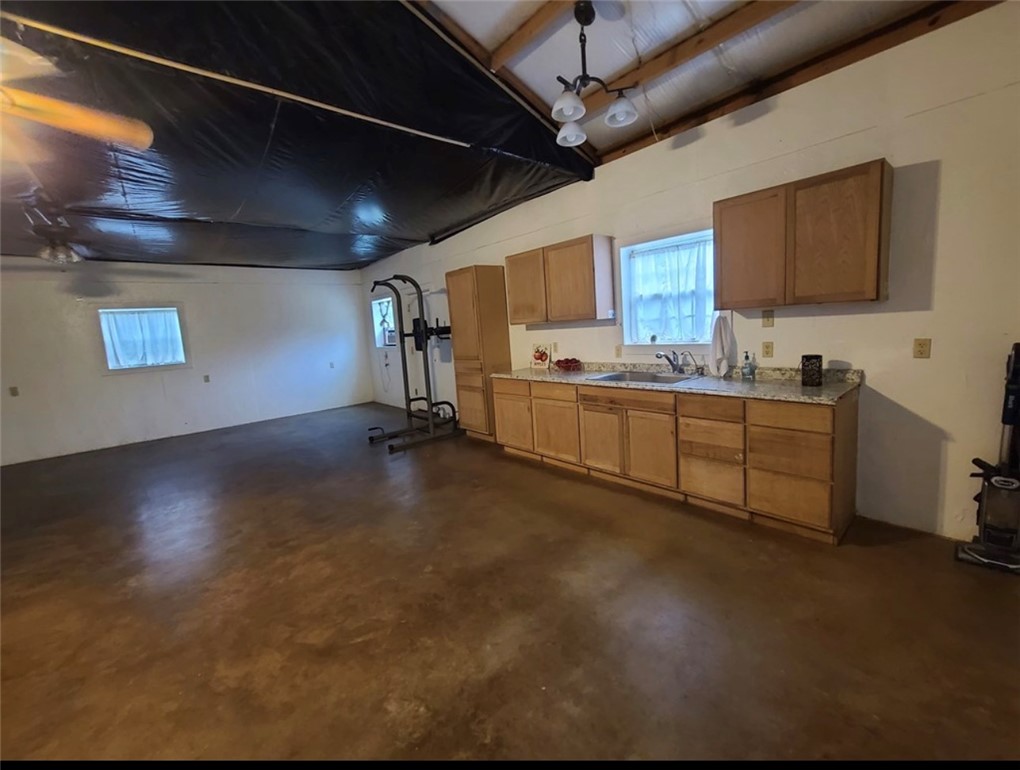 5325 County Road 2291 Centerville, TX 75833 - Photo 23 of 31 Garage featuring a sink and a ceiling fan
