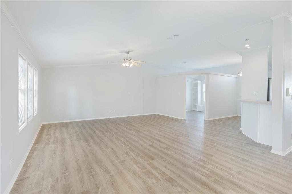 4775 Highway 91 Denison, TX 75020 - Photo 12 of 19 wooden floor in an empty room with a window