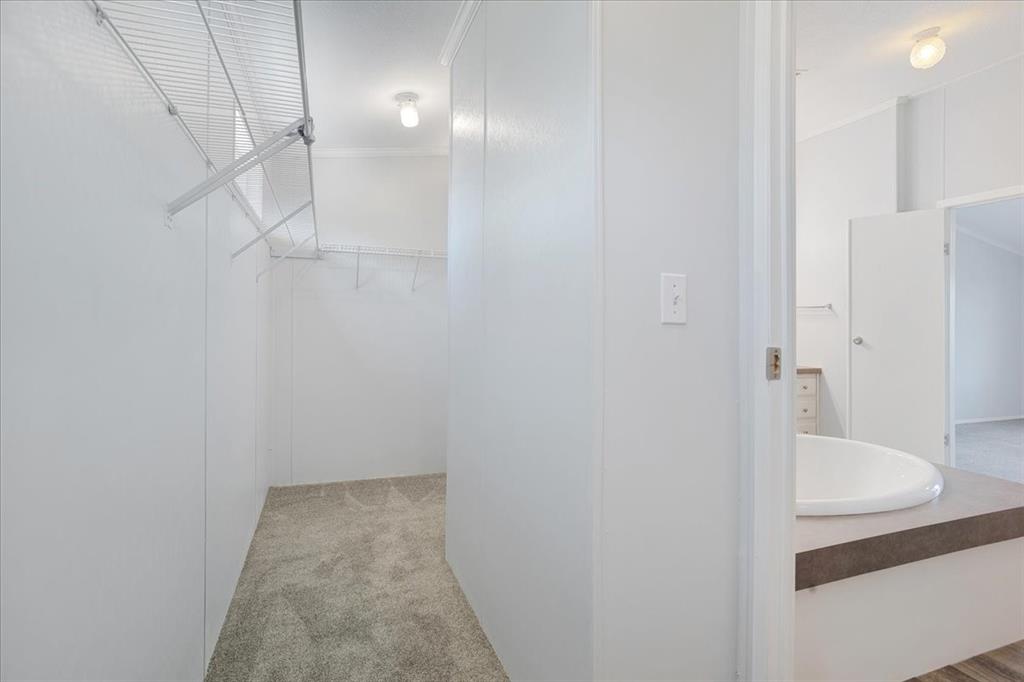 4775 Highway 91 Denison, TX 75020 - Photo 13 of 19 a bathroom with a shower and a sink