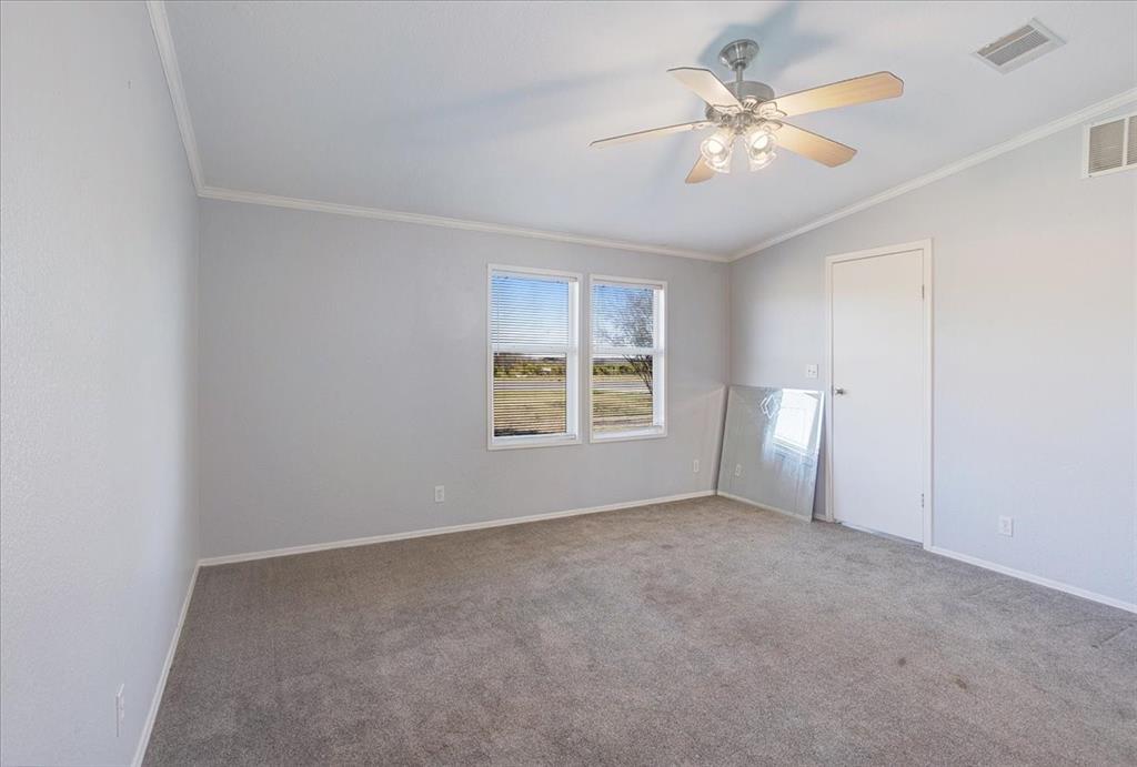 4775 Highway 91 Denison, TX 75020 - Photo 17 of 19 a view of an empty room with a window