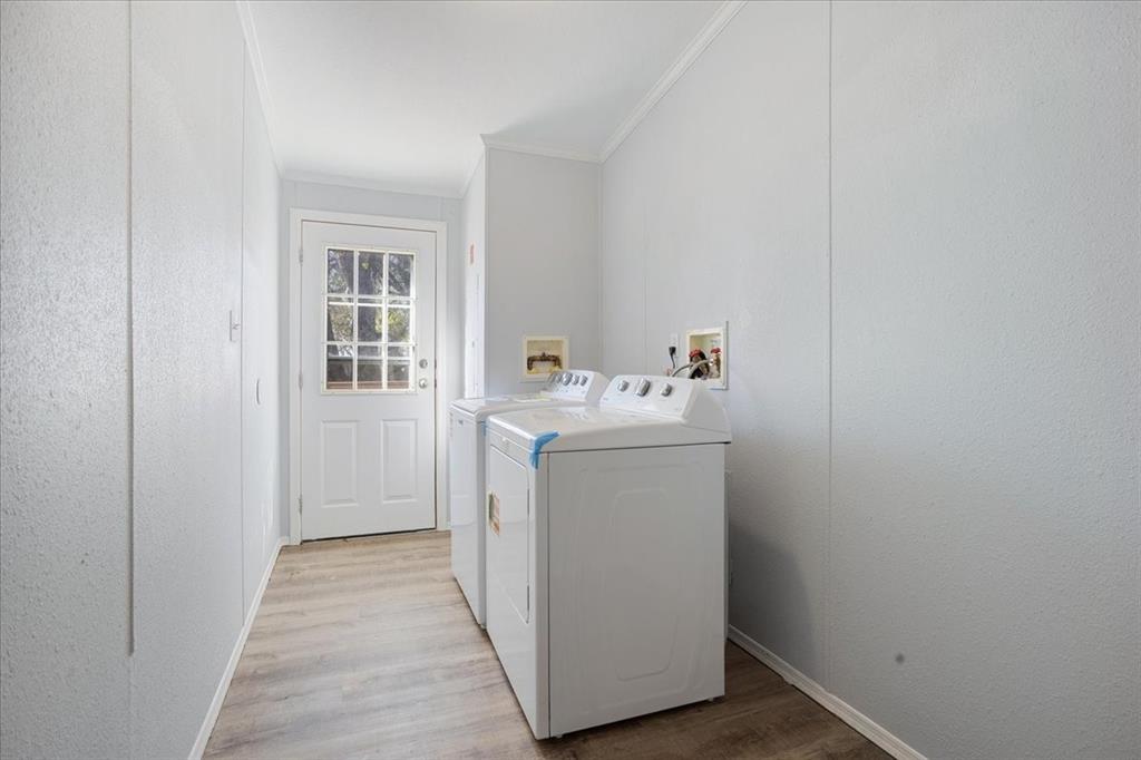 4775 Highway 91 Denison, TX 75020 - Photo 10 of 19 a utility room with dryer and washer
