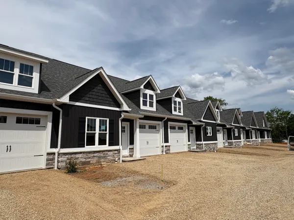 front view of a house with a street