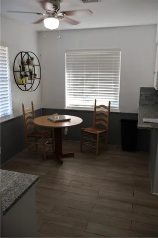 a view of a workspace with furniture