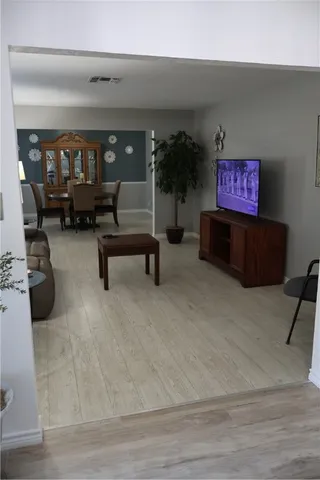 a view of a livingroom with furniture and a couch