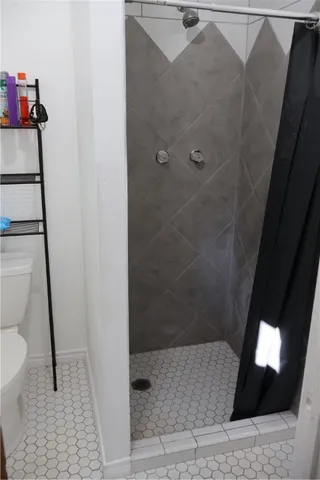 a bathroom with a sink and toilet