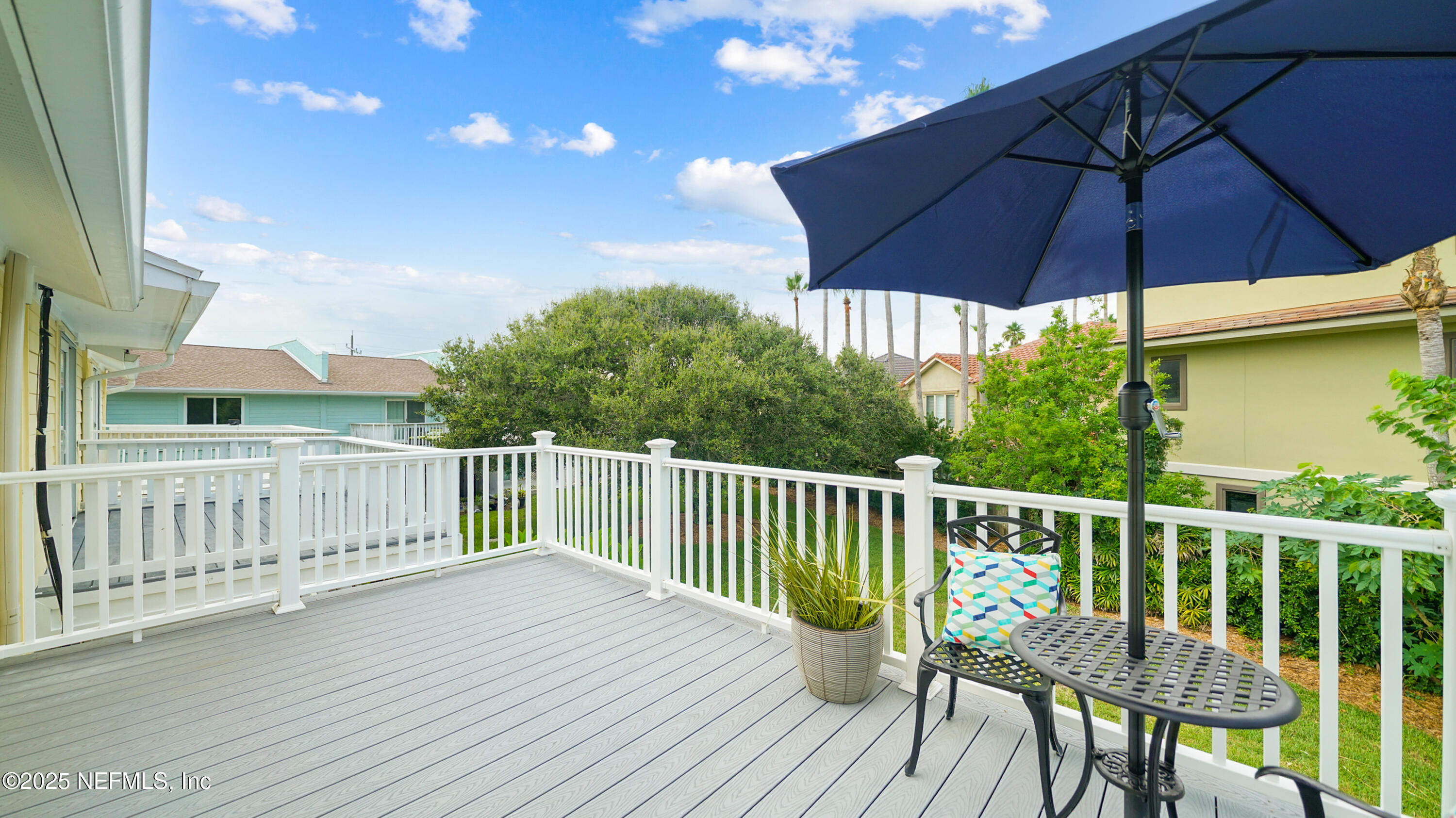 2233 Seminole Road, Unit 7 Atlantic Beach, FL 32233 - Photo 33 of 52 a view of balcony with furniture and umbrella