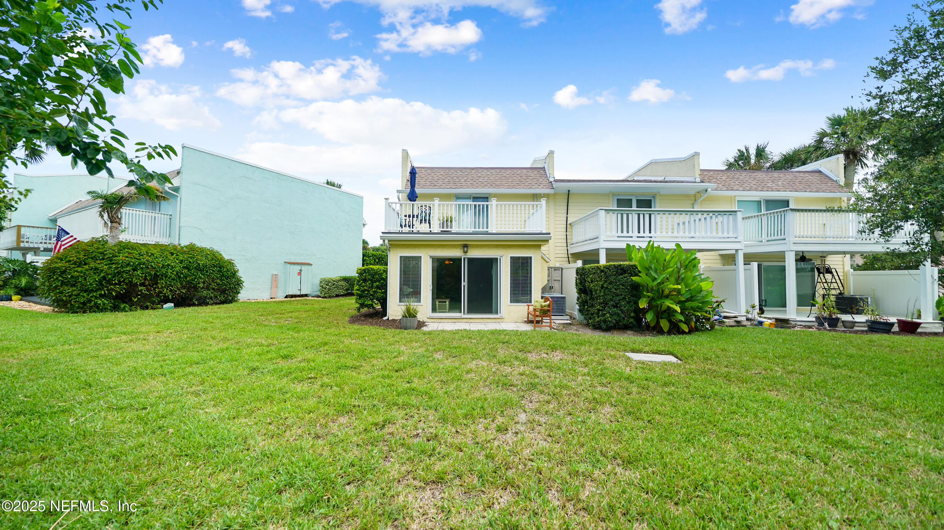 2233 Seminole Road, Unit 7 Atlantic Beach, FL 32233 - Photo 45 of 52 a view of an house with backyard space and balcony