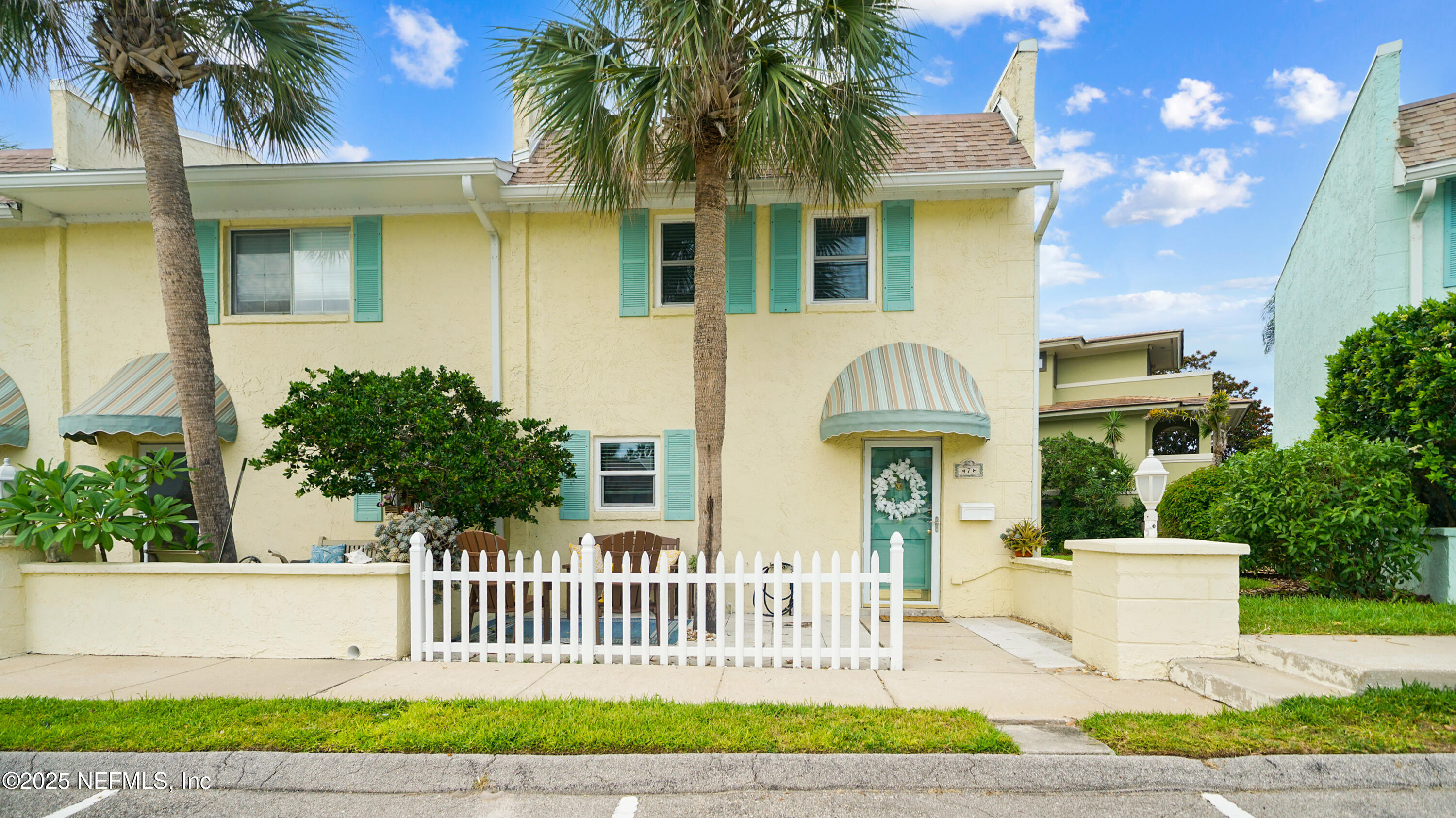 2233 Seminole Road, Unit 7 Atlantic Beach, FL 32233 - Photo 47 of 52 a front view of a house with a garden