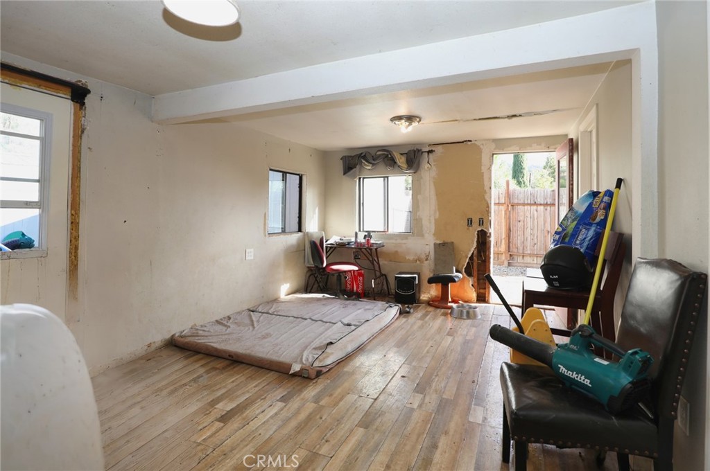 12932 3rd Street Clearlake Oaks, CA 95423 - Photo 6 of 10 a living room with furniture rug and a window