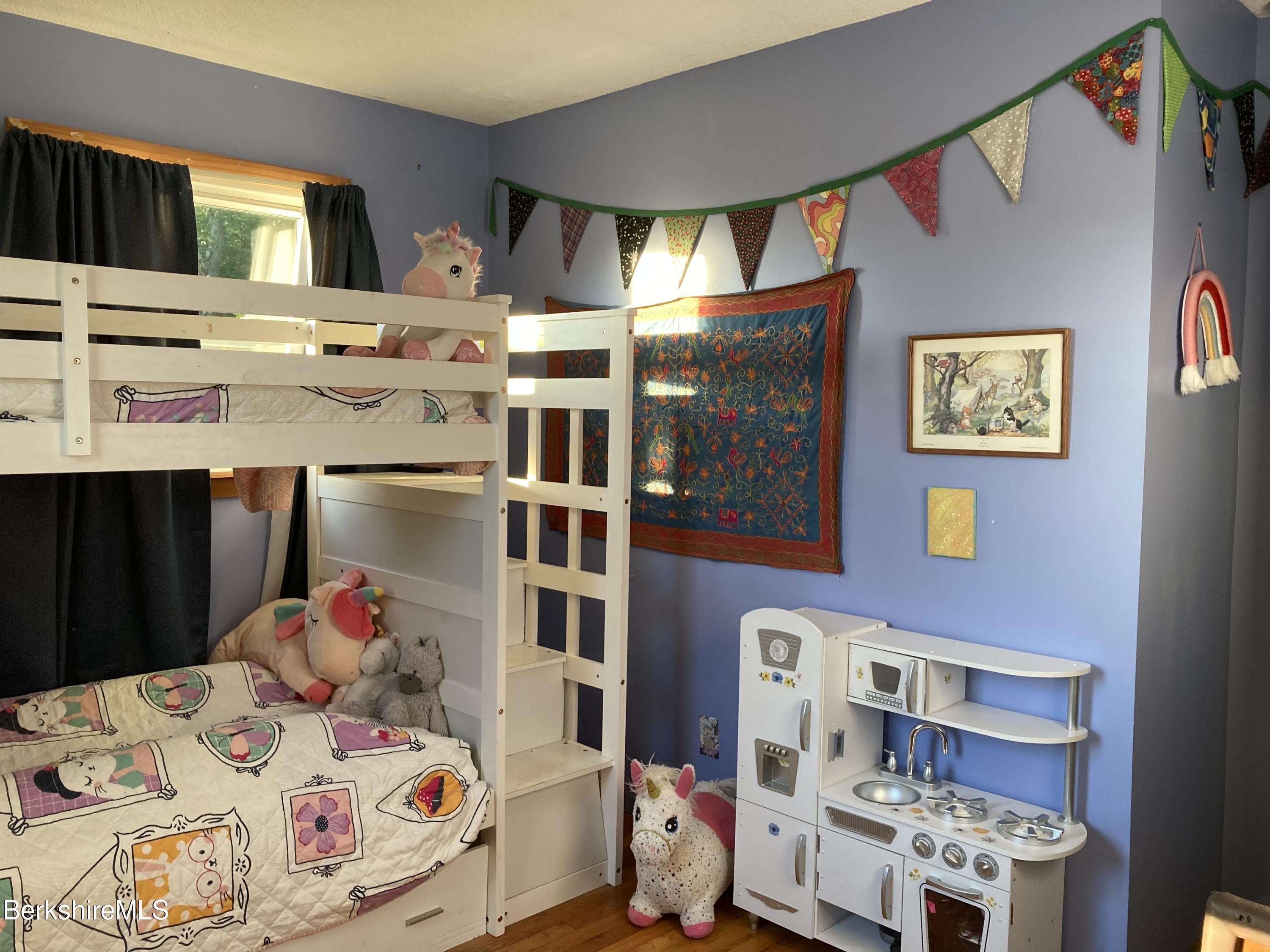 16 West Main Road Peru, MA 01235 - Photo 13 of 15 a bedroom with a bed and a bed