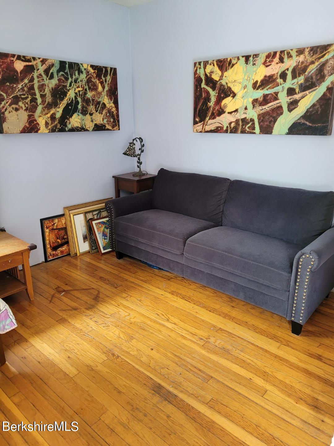 16 West Main Road Peru, MA 01235 - Photo 8 of 15 a living room with a couch