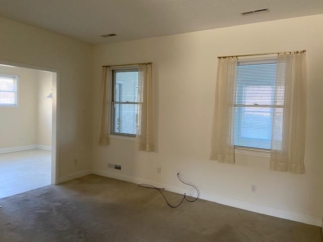 103 Dancer Lane Oak Ridge, TN 37830 - Photo 2 of 26 an empty room with windows