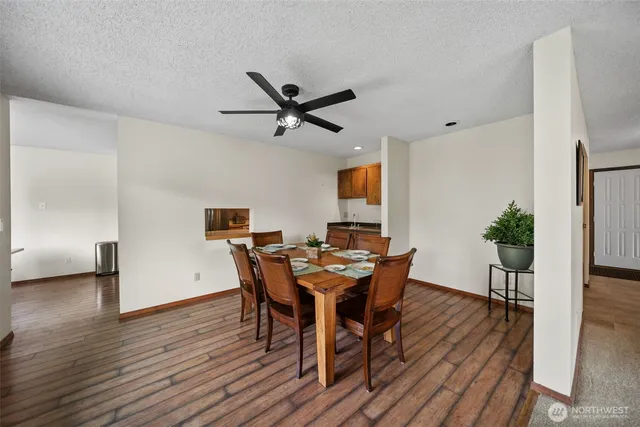 a view of a room with furniture window and wooden floor