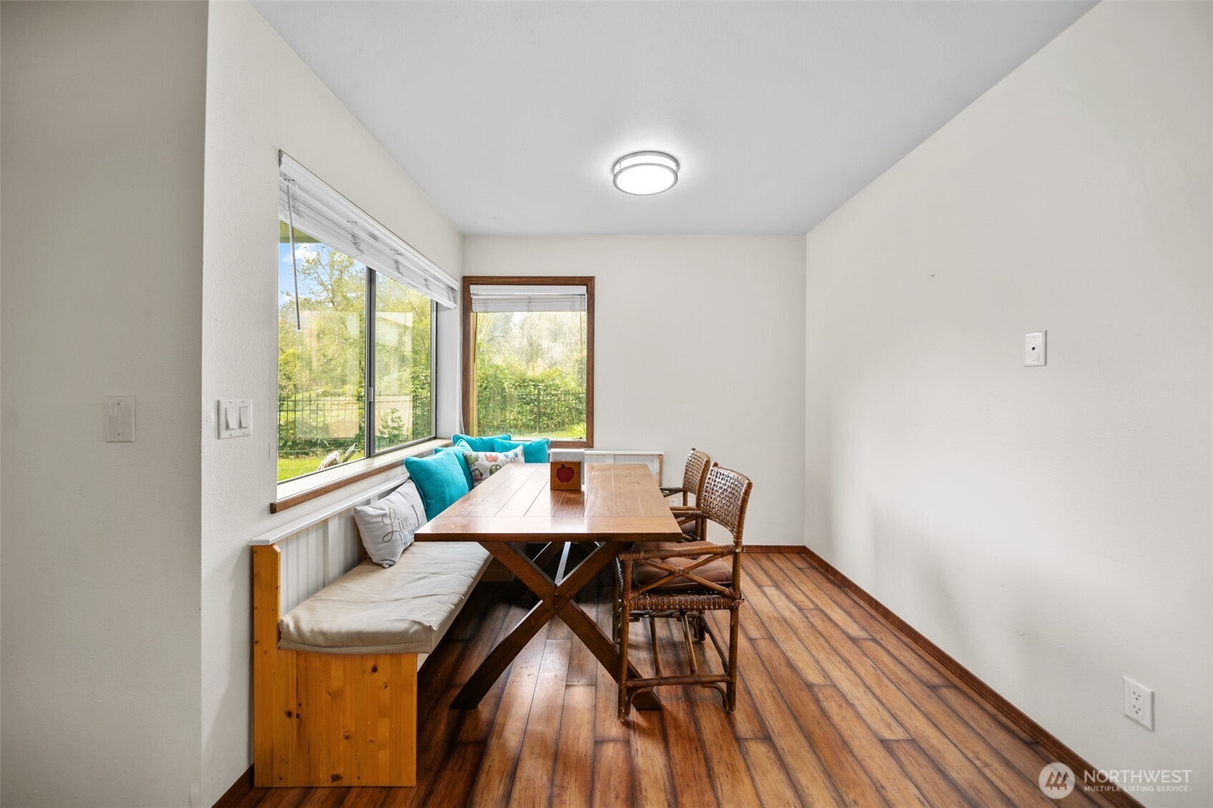 225 19th Street Northeast, Unit 23 East Wenatchee, WA 98802 - Photo 13 of 40 a view of a room with furniture window and wooden floor