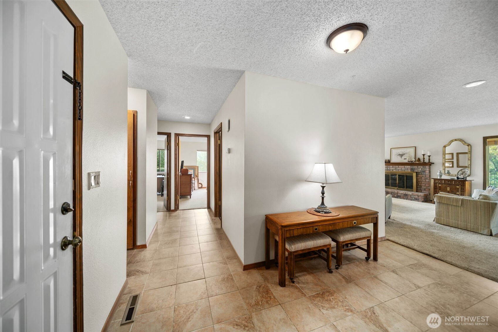 225 19th Street Northeast, Unit 23 East Wenatchee, WA 98802 - Photo 20 of 40 a living room with furniture and a table
