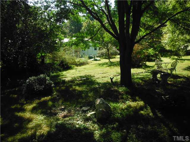 5859 Kiger Road Rougemont, NC 27572 - Photo 19 of 20 Gardens looking to front of home