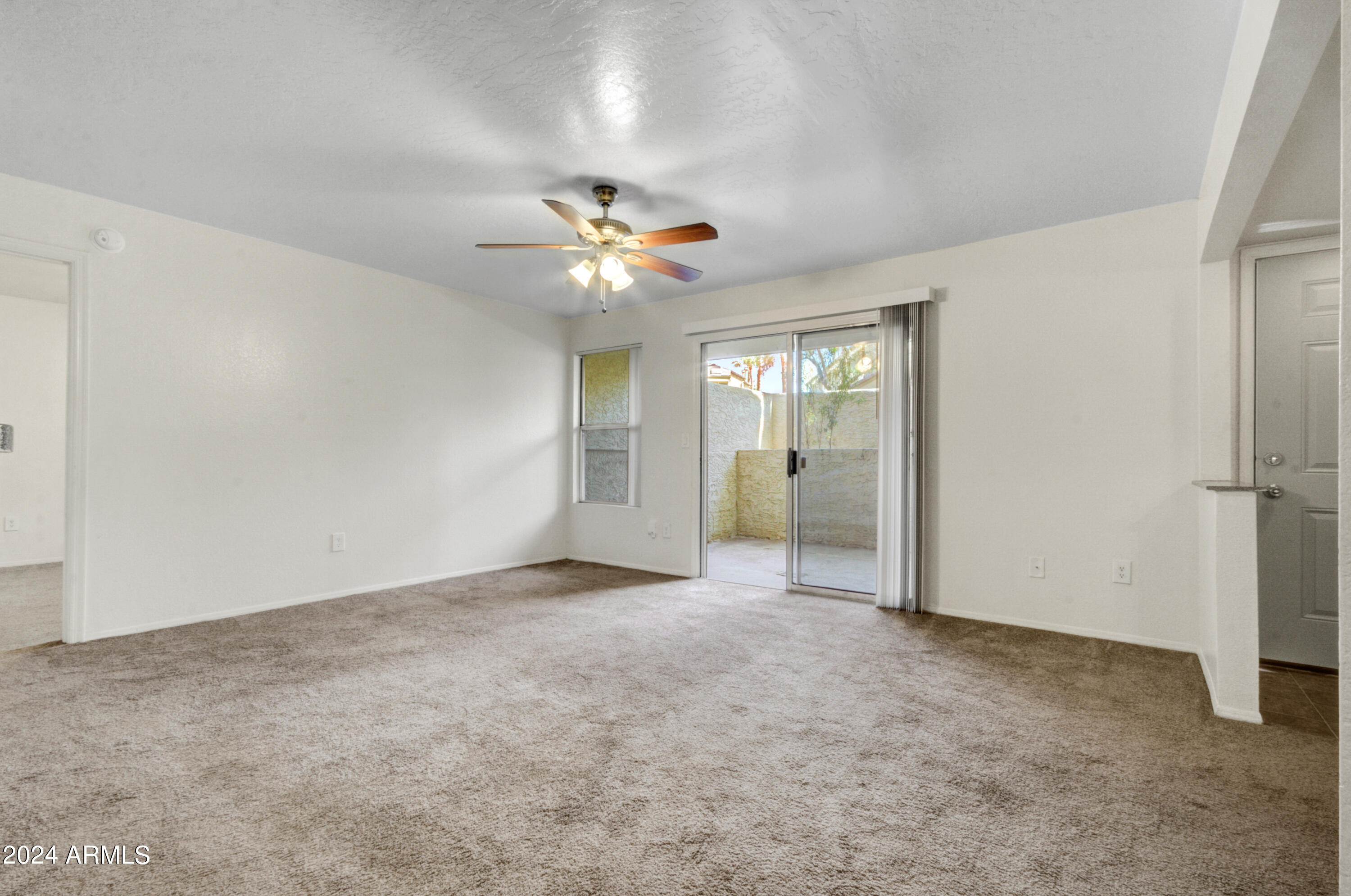 1331 West Baseline Road, Unit 118 Mesa, AZ 85202 - Photo 6 of 21 006_Living Room to Patio