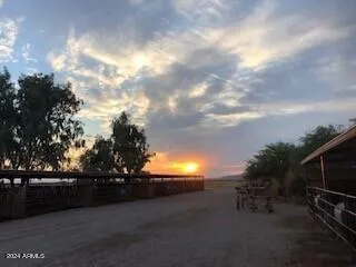 a view of backyard with outdoor seating and mountain view